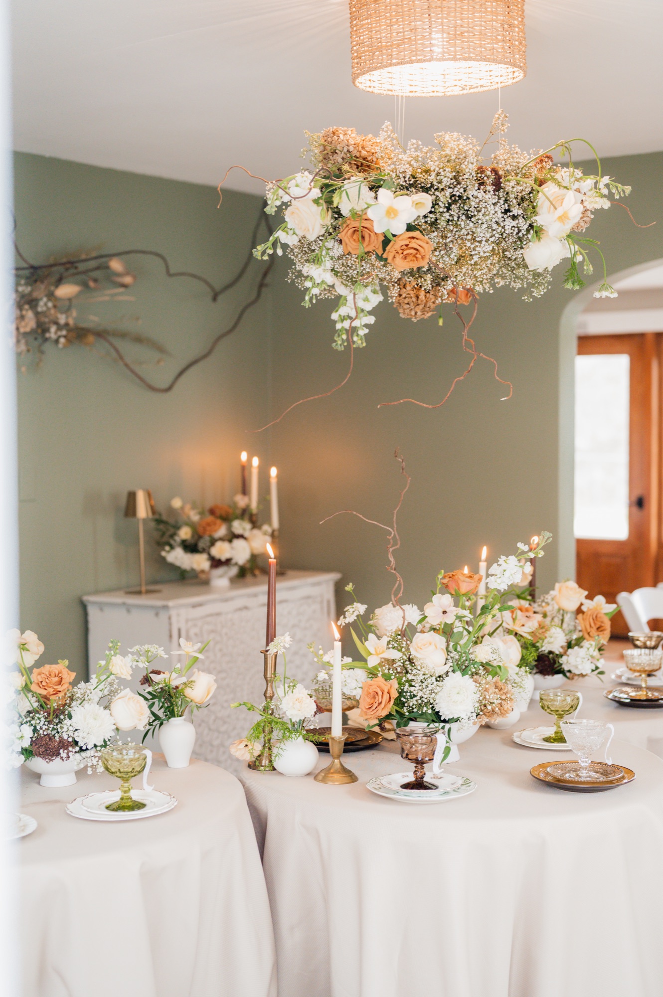 AVENTZ Co. event design — sage green wall with floral tablescapes, Wonderland Photography