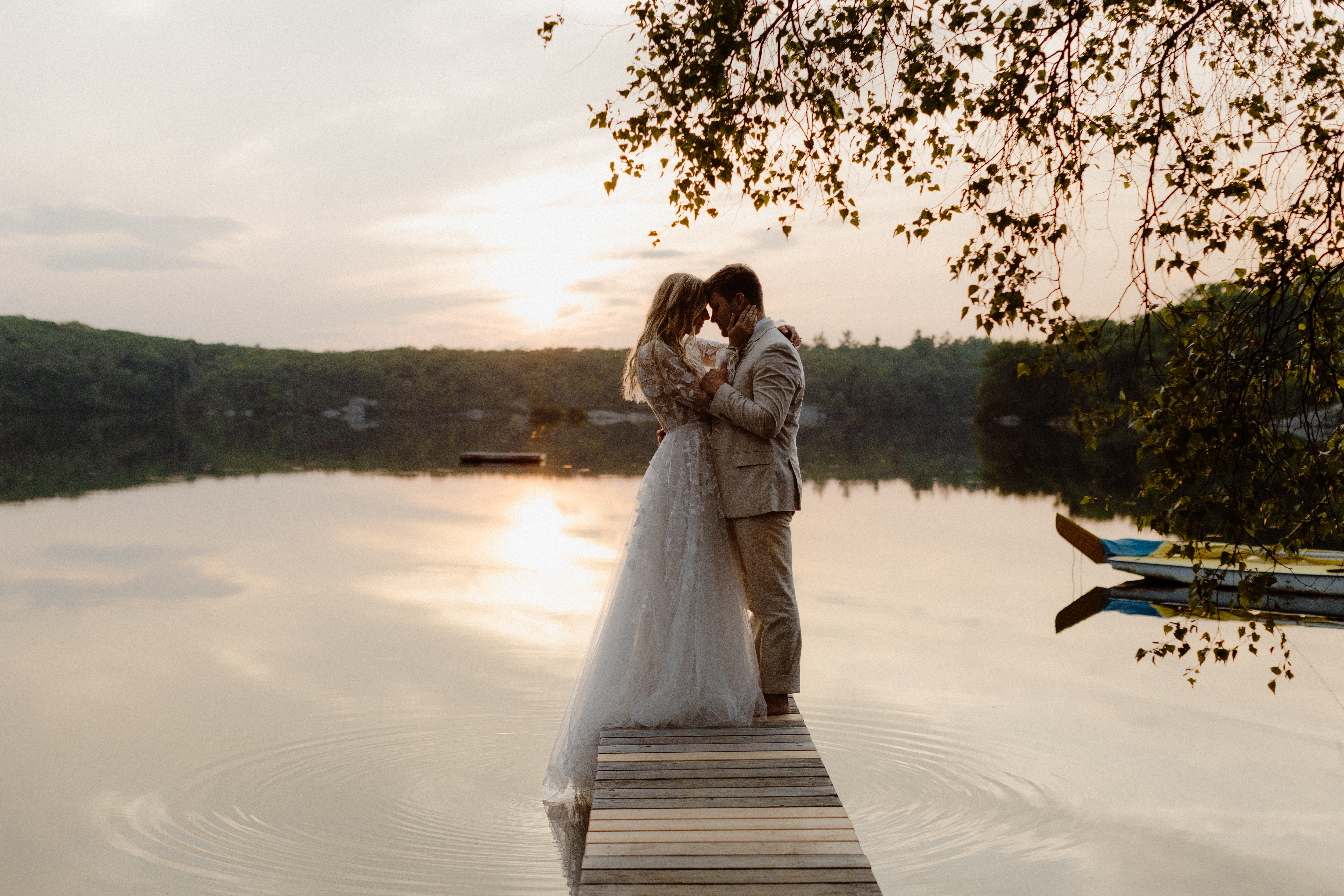 couple embracing on dock