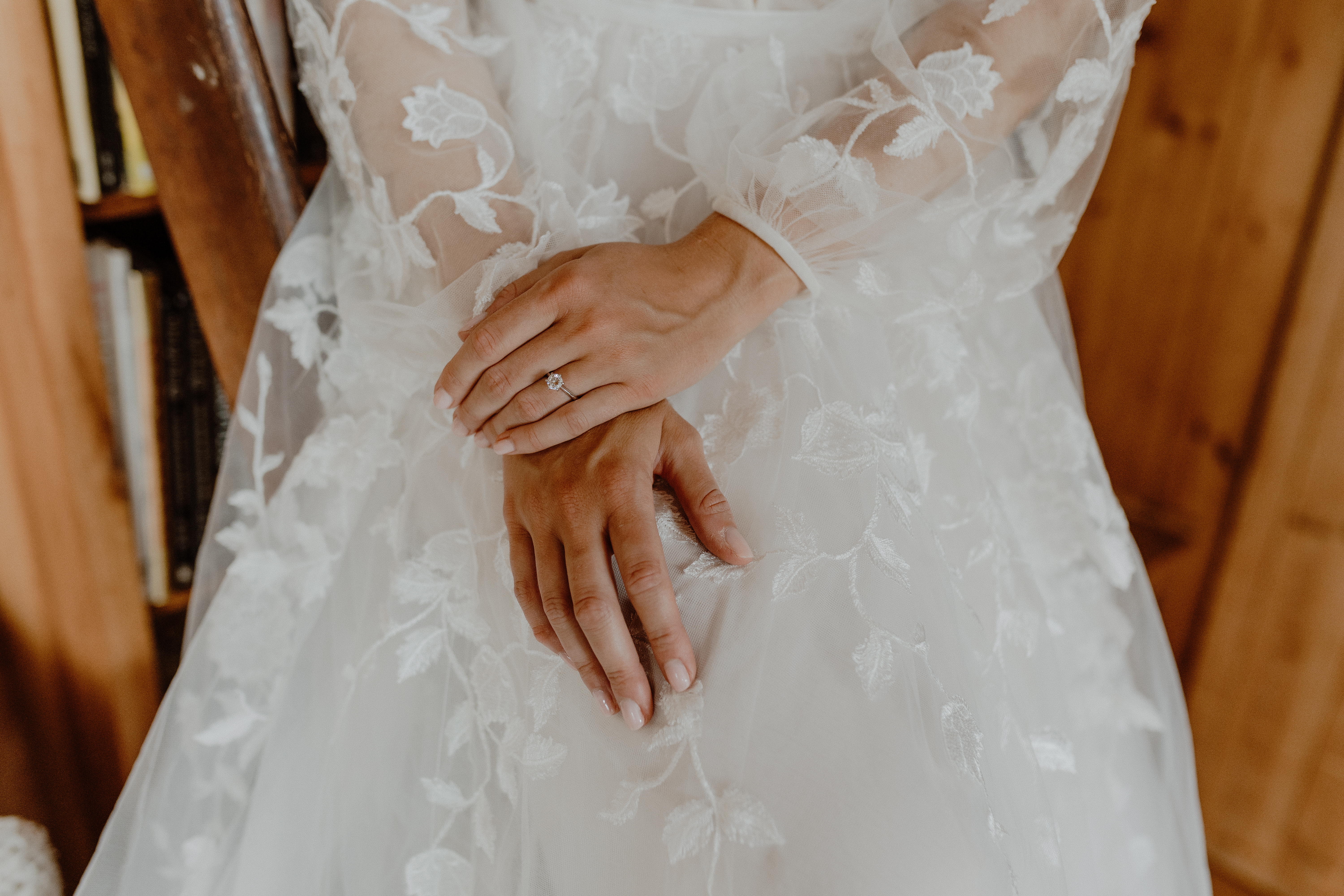 bride's hands in her lap showing off ring