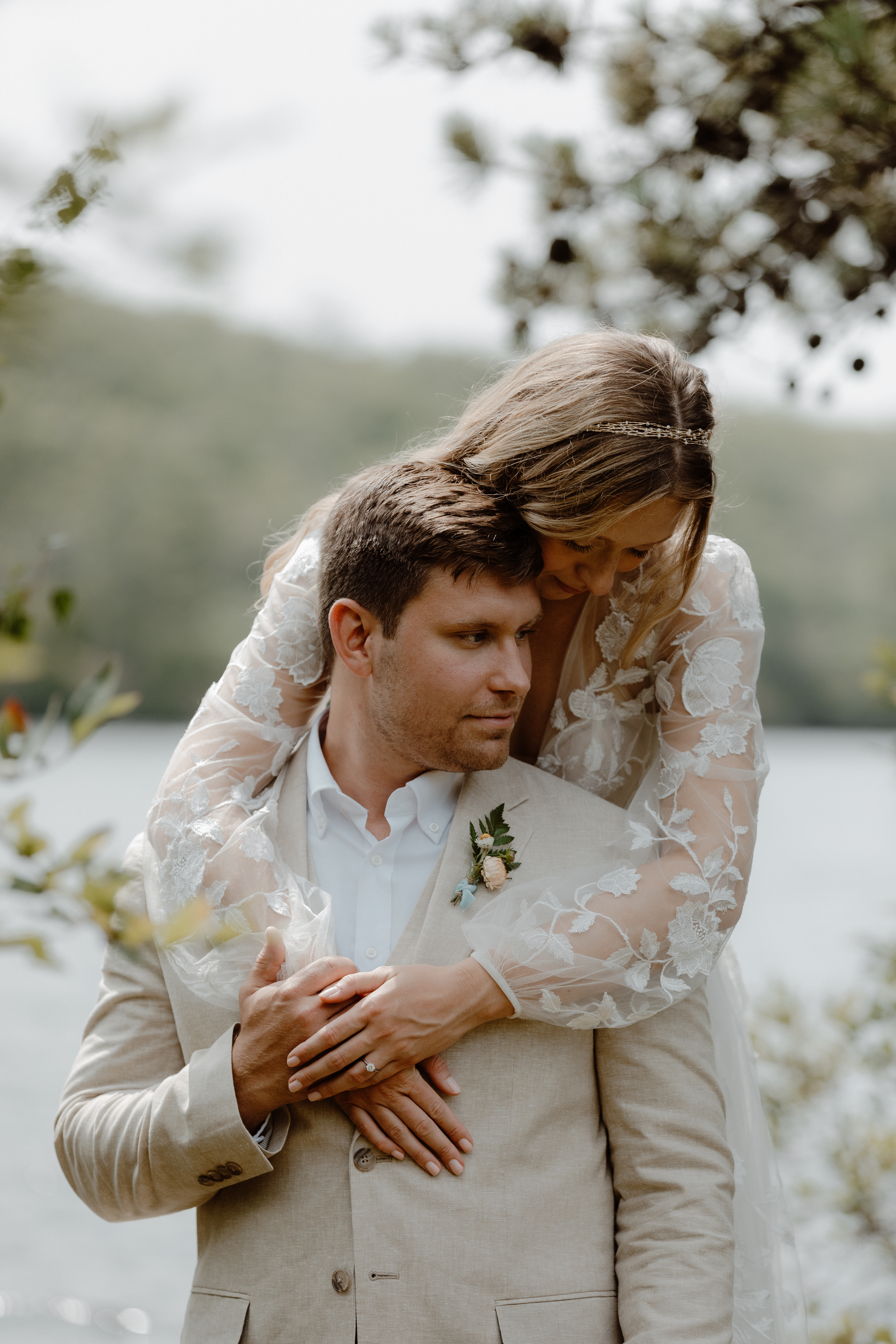 bride hugging groom's shoulders