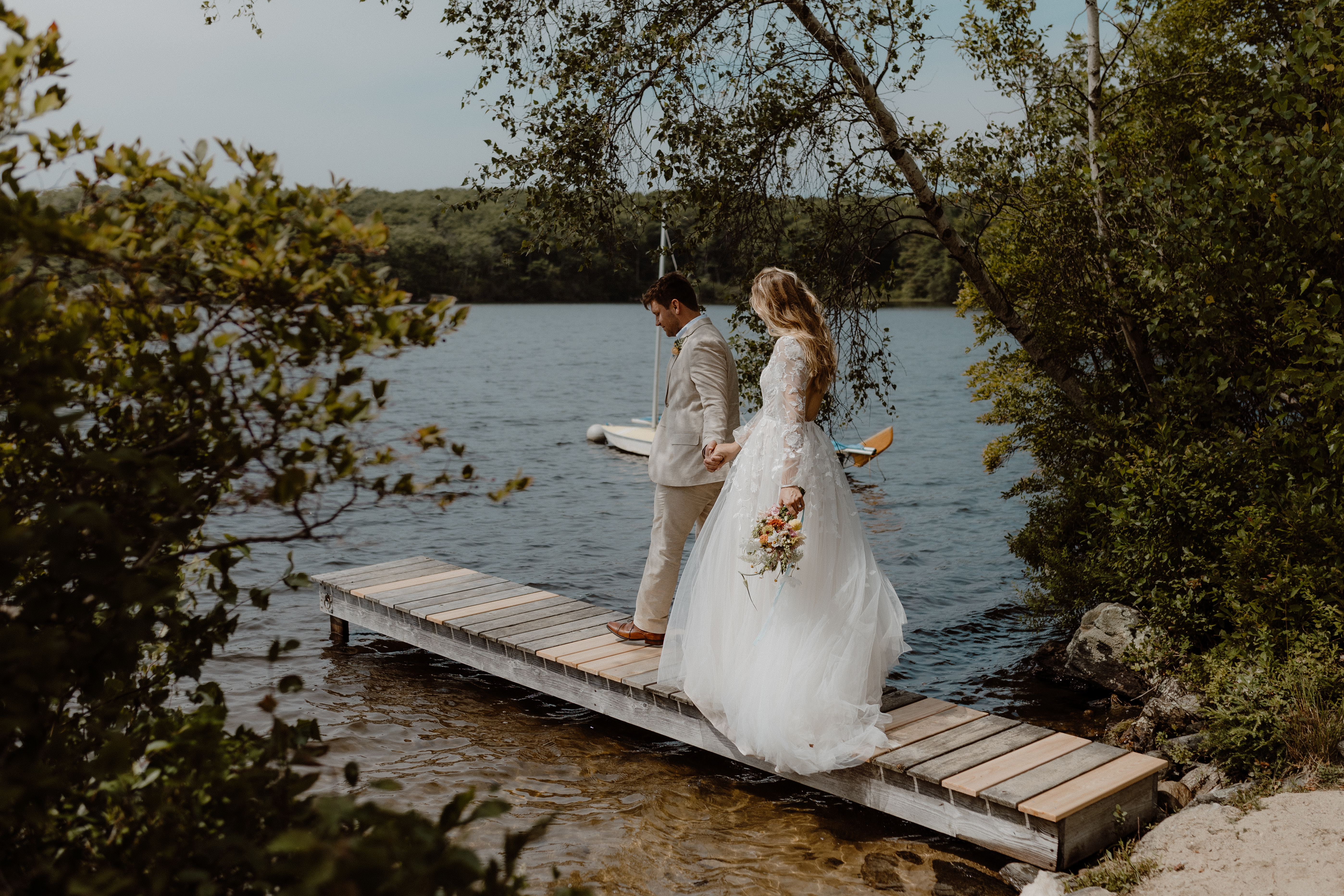 couple walking on dock