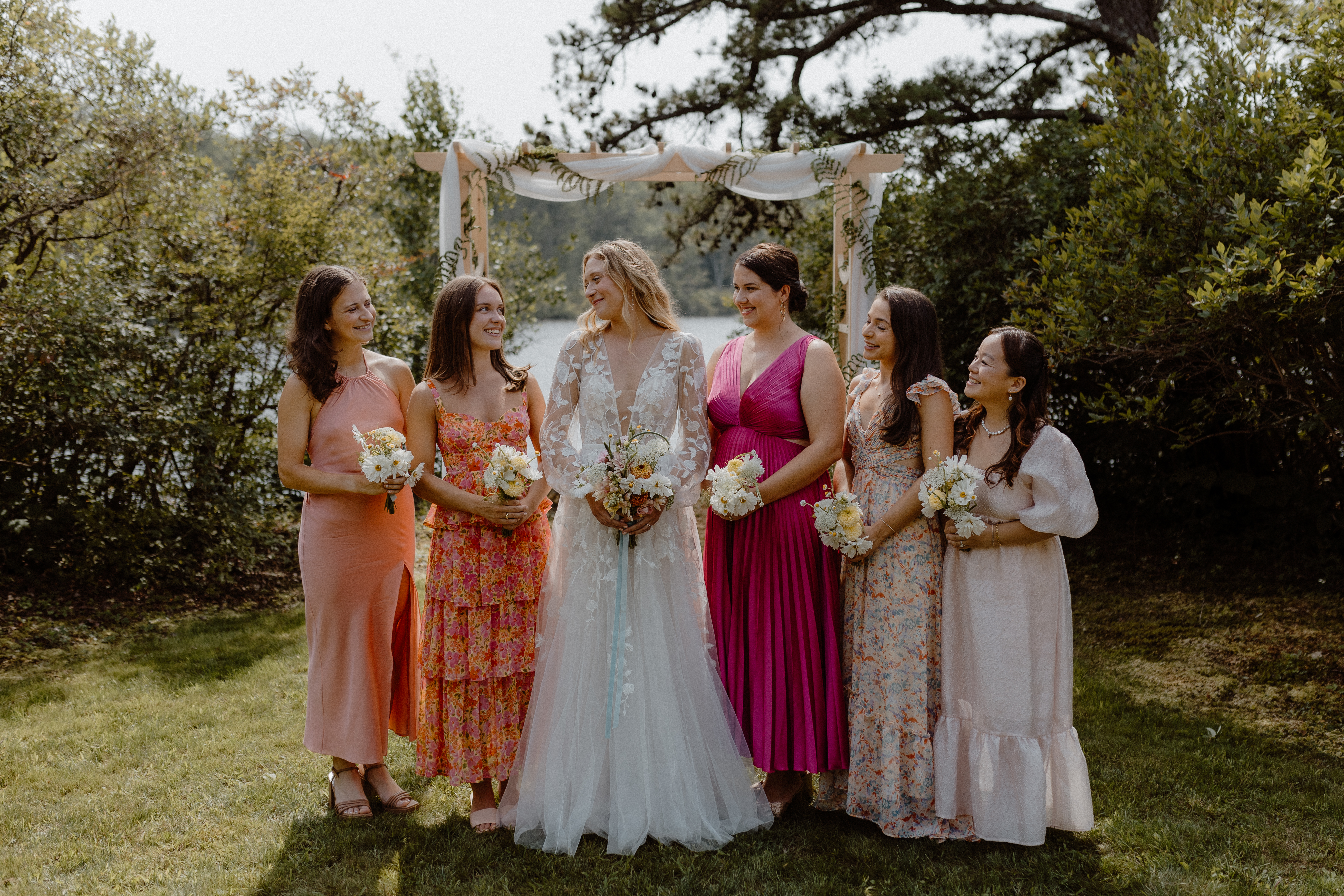 bride with bridesmaids in summer dresses