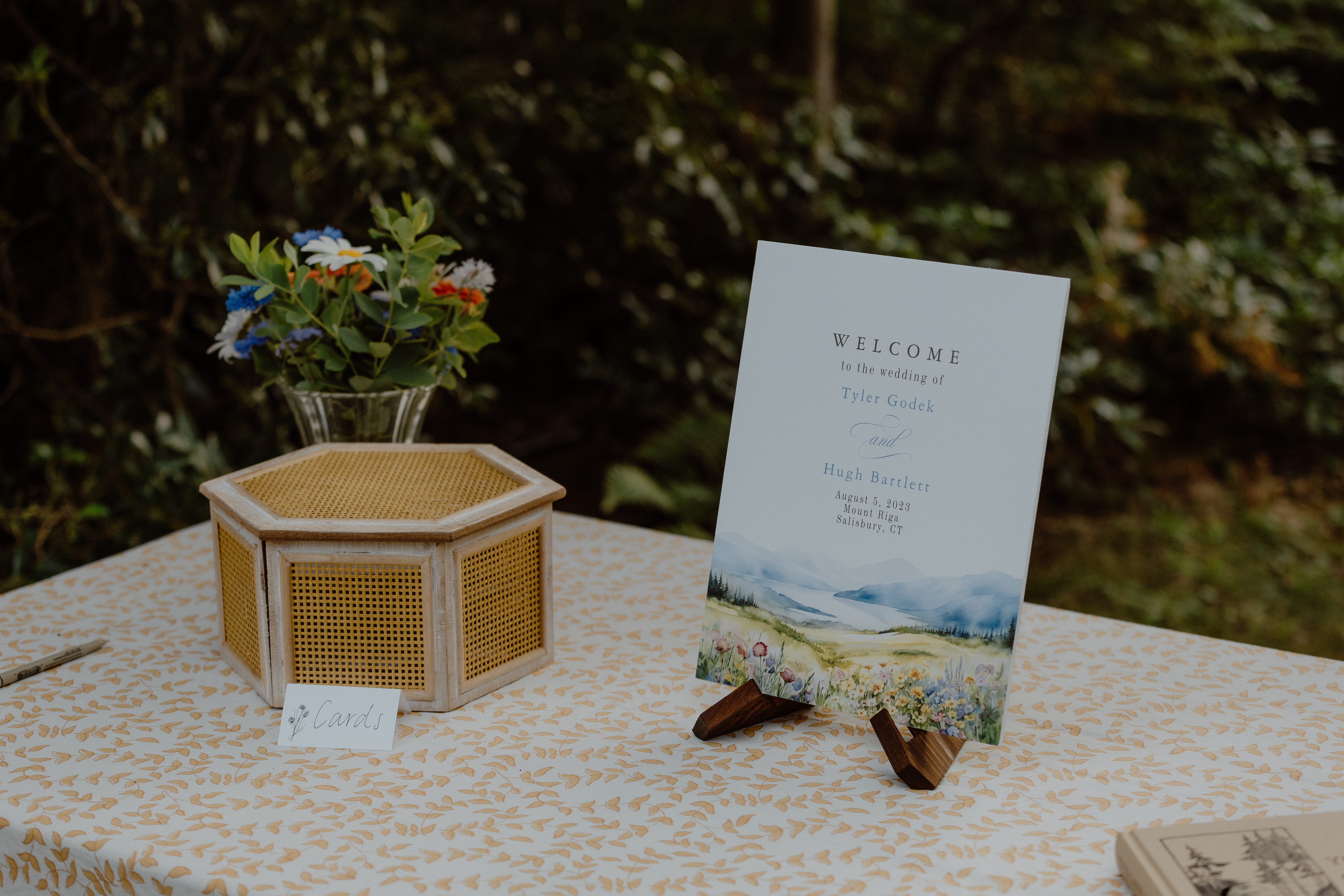 summer wedding welcome sign on card table