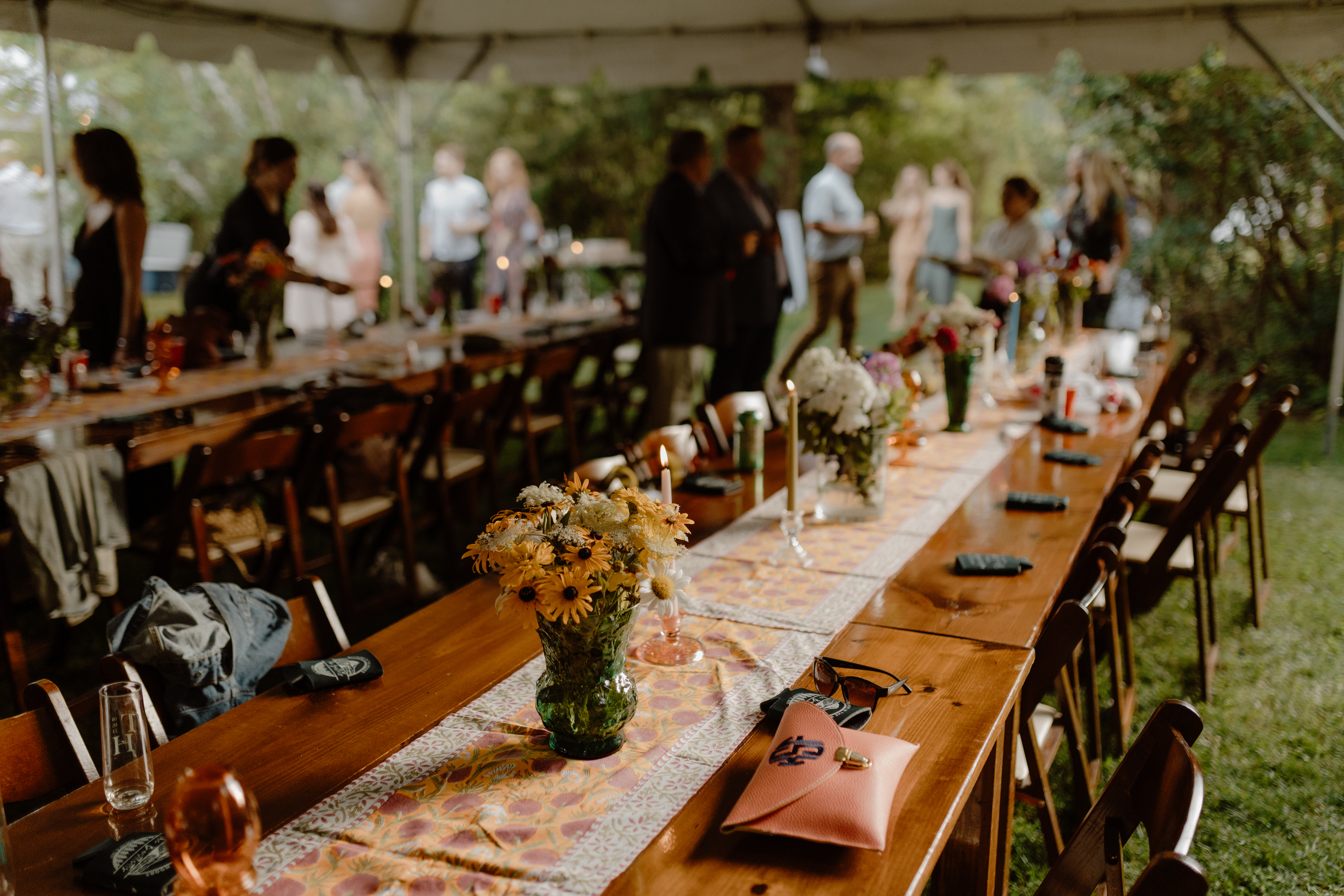 summer wedding reception with simple decor and flowers