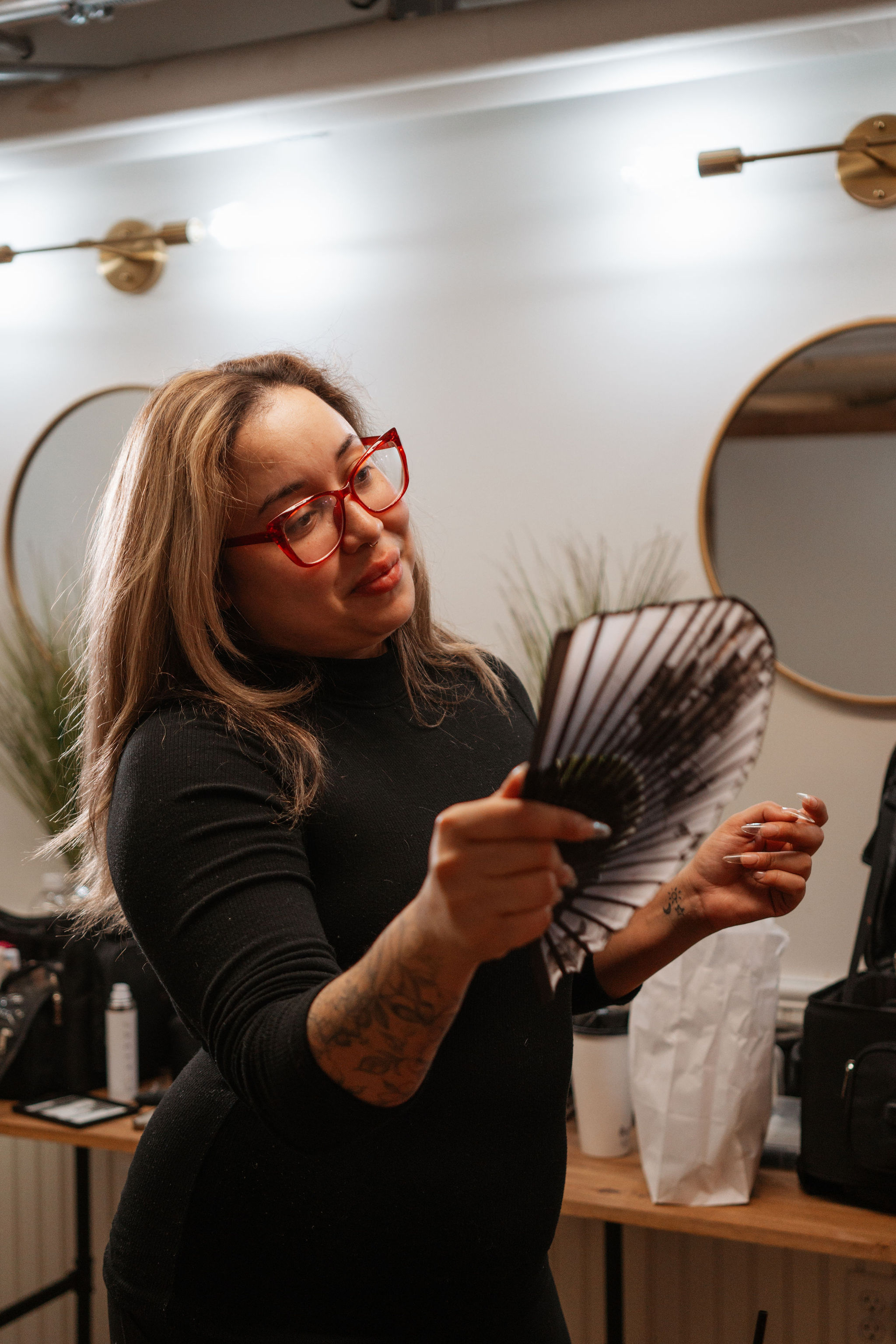 makeup artist drying bride's face
