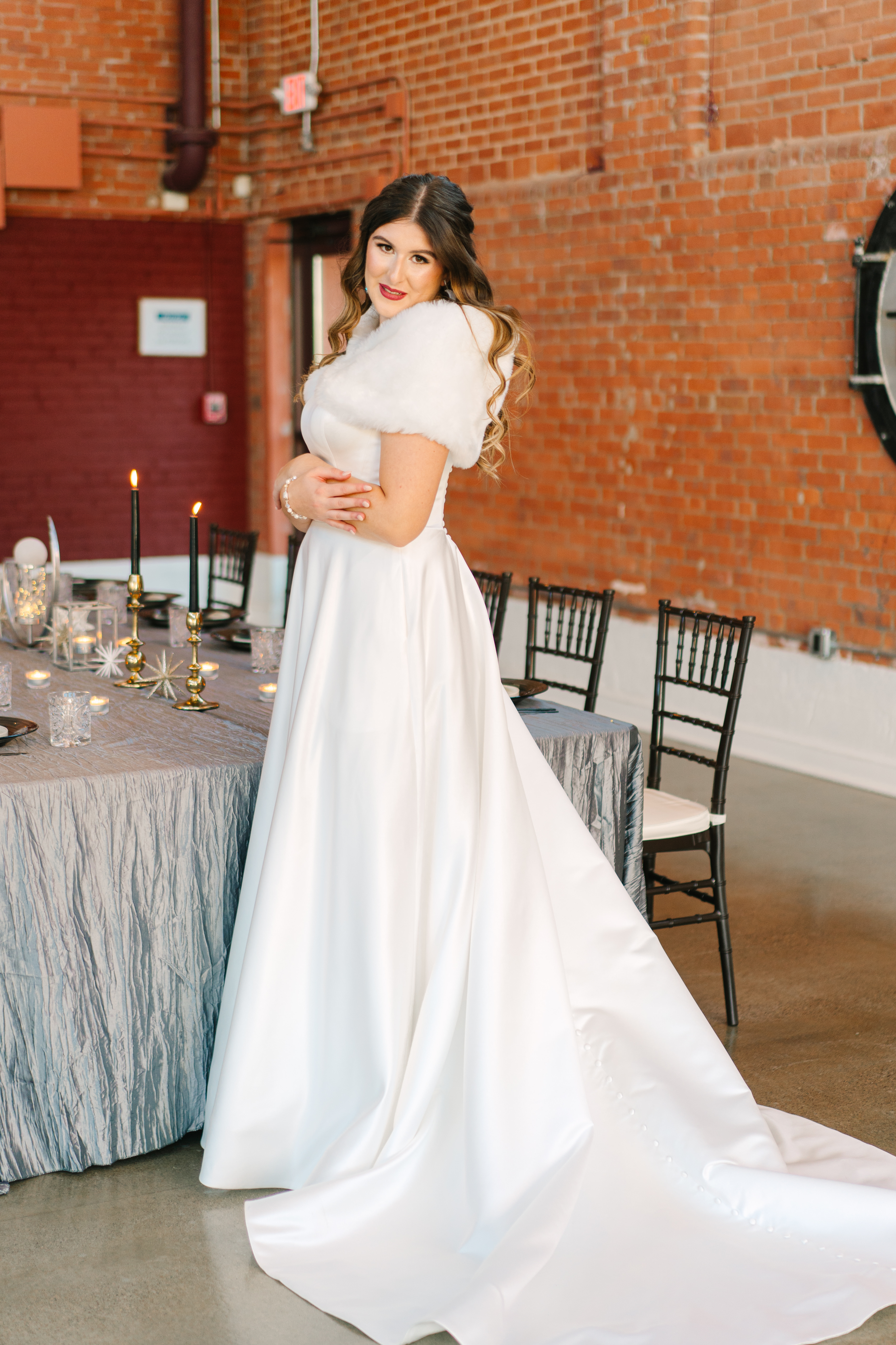 bride posing in fur shaw